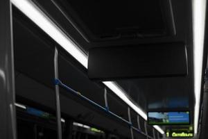 Interior of bus. Night bus. Public transport details.