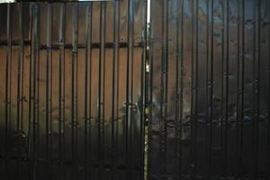 Steel fence in detail. Fence made of metal profile. Durable material to protect against prying eyes. photo