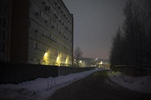 Industrial zone outside city. Institute building at night. Urban view details. photo