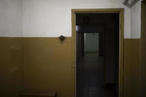 Entrance to premises. Doorway. Empty corridor. Old premises. photo