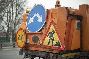 Road signs on special equipment. Car for cleaning. photo