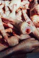 Chicken feet in street market, to make exotic dishes rich in collagen in Minas Gerais, Brazil photo