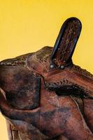 Worn leather western style horse saddle