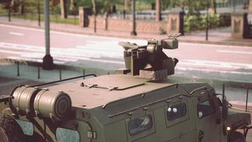 armored military car in big city photo