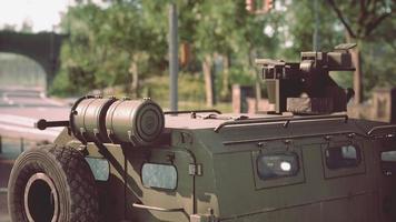 armored military car in big city photo