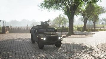 armored military car in big city photo