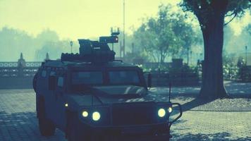 armored military car in big city photo