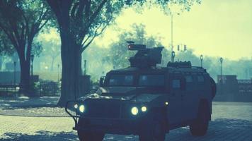 armored military car in big city photo