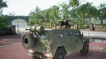 armored military car in big city photo