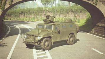 armored military car in big city photo