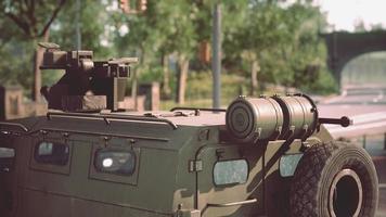 armored military car in big city photo