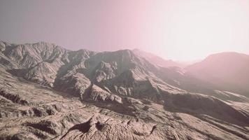 View of the Afghan mountains in fog photo