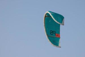 windsurfing, kitesurfing, water and wind sports powered by sails or kites photo