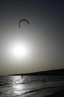 windsurfing, kitesurfing, water and wind sports powered by sails or kites photo