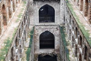 Agrasen Ki Baoli Step Well situated in the middle of Connaught placed New Delhi India, Old Ancient archaeology Construction photo