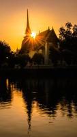 silhouette of Wat Temple beautiful temple in the historical park Thailand photo