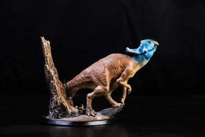 Protoceratops  , dinosaur on black background photo