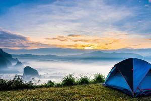 landscape of mountains fog and tent Phu Lanka National Park Phayao province north of Thailand photo