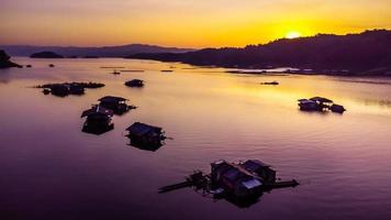 Aerial view of landscape sunset with Reservoir and raft house Thailand photo