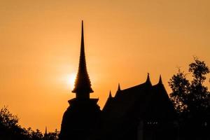 silhouette of Wat Temple beautiful temple in the historical park Thailand photo