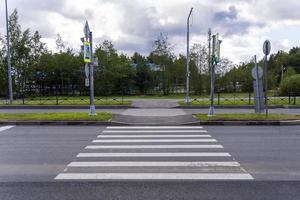 Pedestrian crossing at a city intersection, Zebra traffic walk way in the city photo