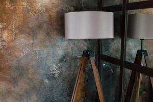 Corner of a modern drawing room with a lamp photo