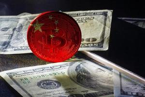 Bitcoin close up on keyboard background the flag of china is shown on bitcoin photo