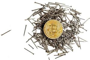 Gears and cogs close up and bitcoin coin white background spike isolated photo