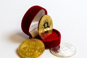 Coin bitcoin in a gift box for a ring or jewelry the concept of crypto currency the best gift photo