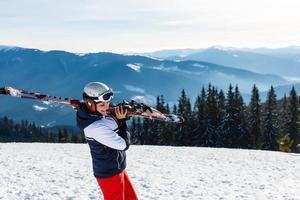 woman skier in the mountains photo