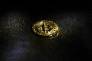 Golden bitcoins with the spotlight photo