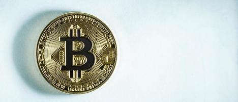 Face of the crypto currency golden bitcoin isolated on white background the concept of virtual photo