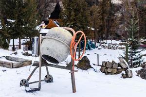 Concrete Mixer Under Snow photo