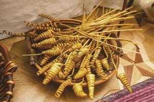 Stack with a straw straw linked blue string in a haystack harvesting rye in the summer the straw photo