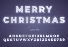 3d Christmas light bulb alphabet isolated on blue background. Winter Xmas or New Year party celebration.