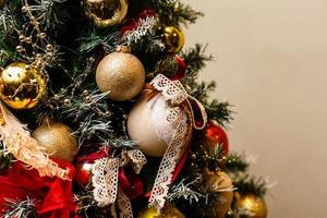 Christmas tree background and Christmas decorations with snow, blurred, sparking, glowing. Happy New Year and Xmas theme photo