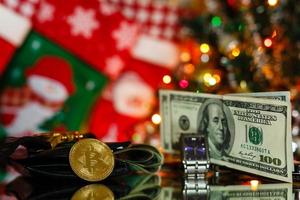 Watches with bitcoin close up on christmas background photo