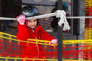 Little girl on ski photo