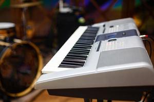 Piano close up black and white Piano keyboard background with selective focus, studio music synthesizer keyboard side view of instrument musical tool photo