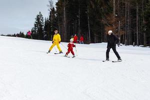 Young Family On Ski Vacation photo