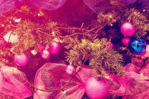 Christmas tree with toys and decorative snow for a happy new year photo