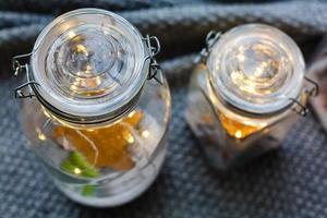 Beautiful lights, garland in a jar with textile. Love or valentine's day concept photo