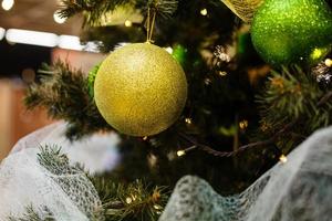 New Year decor with a Christmas tree with balls photo