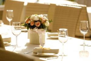 Served table with glasses in restaurant. photo