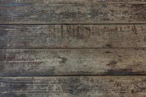 panel de pared de tablones de madera natural textura en mal estado horizontal. Fondo de bricolaje vintage de color madera. recuperar la superficie de la madera. piso de madera gris, mesa, puerta o estructura de techo. de cerca. copie el espacio