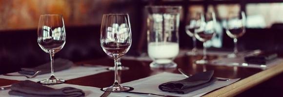 Empty glasses set in restaurant photo