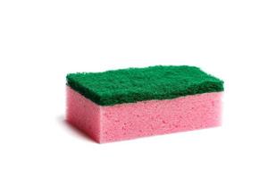 Pink sponge on white isolated background photo