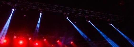 Illuminated empty concert stage with smoke photo