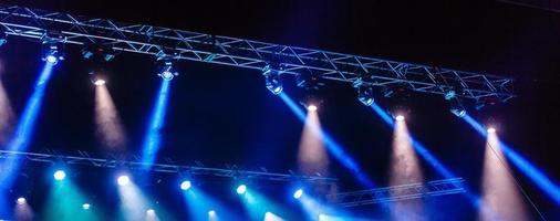 Illuminated empty concert stage with smoke photo