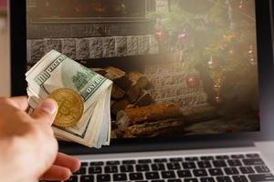 Bitcoin close up on keyboard background of christmas  is shown on bitcoin photo